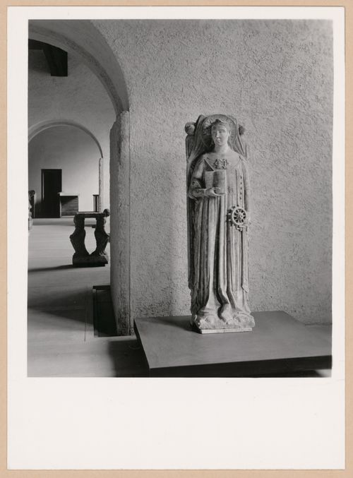 Interior view of a gallery showing a statue with doorways and other galleries on the left, Museo di Castelvecchio, Verona, Italy