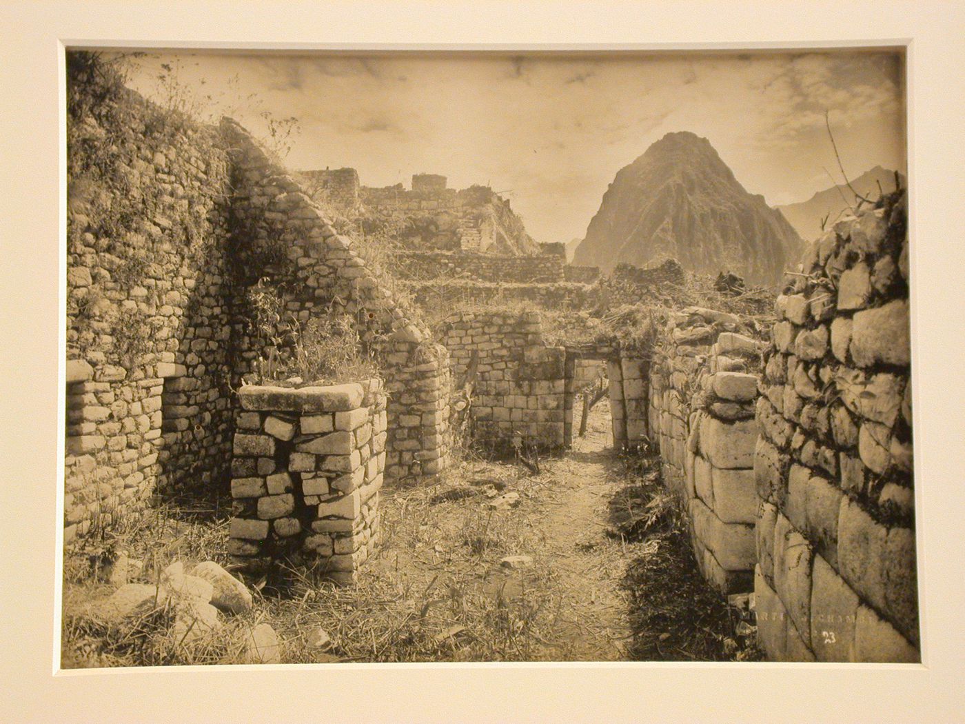 View of unidentified buildings with a mountain in the background, Machu Picchu, Peru