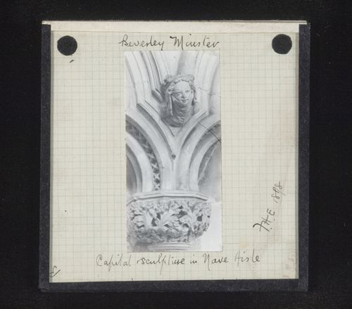 View of capital and sculpture of woman's head in nave of Beverley Minster, Beverley, Yorkshire, England