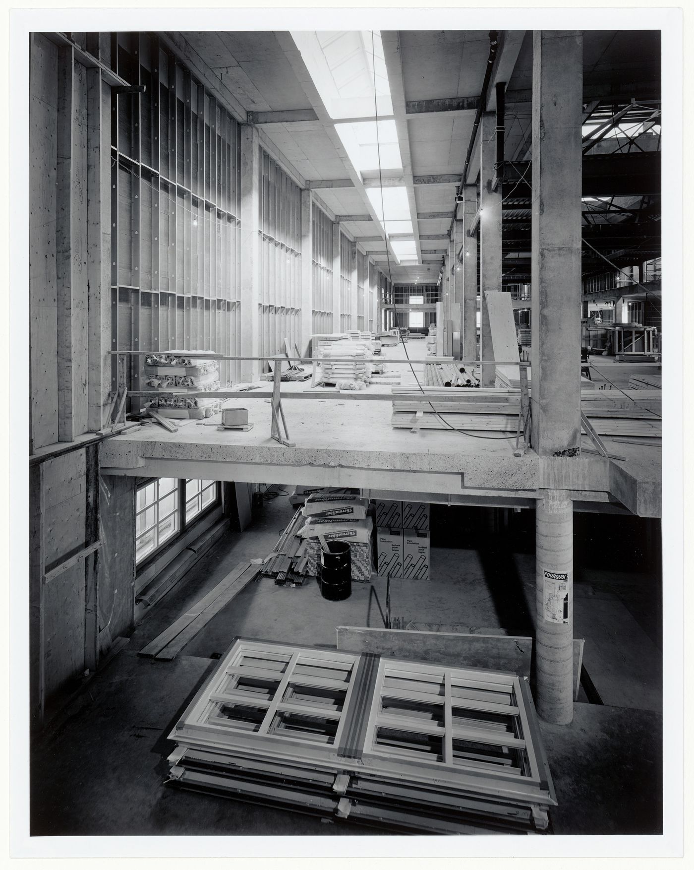 Interior view of the curatorial level and main exhibition galleries from the bookstore, Canadian Centre for Architecture under construction, Montréal, Québec