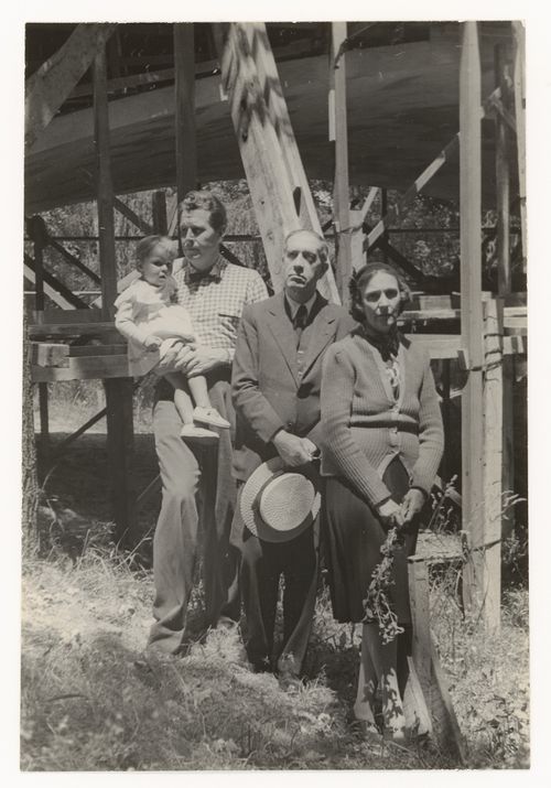 Photograph of Veronica Williams, Amancio Williams, Manuel Gálvez, and Delfina Bunge de Gálvez at the construction site for Casa sobre el arroyo, Mar del Plata, Argentina