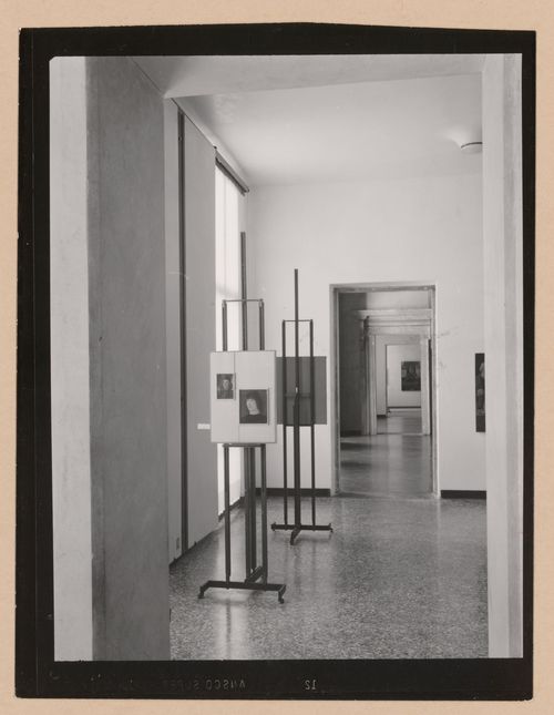 Interior view of a gallery showing paintings on easels with doorways and galleries in the background, Museo Correr, Venice, Italy