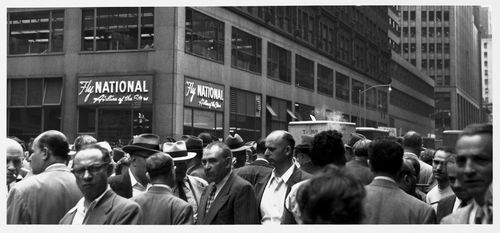 Panoramic view of a crowded street in the garment district, New York City, New York