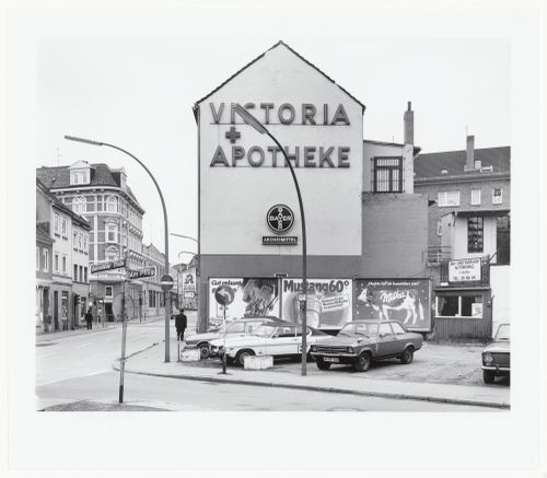 View of intersection of Bahrenfelder strasse and Am Pflug, with Victoria Apotheke at center, Hamburg, Germany