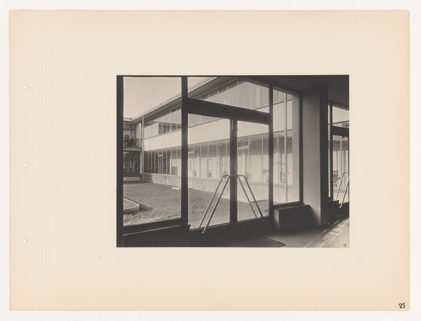 View of the west courtyard through glass doors, Budge Foundation Old People's Home, Frankfurt am Main, Germany