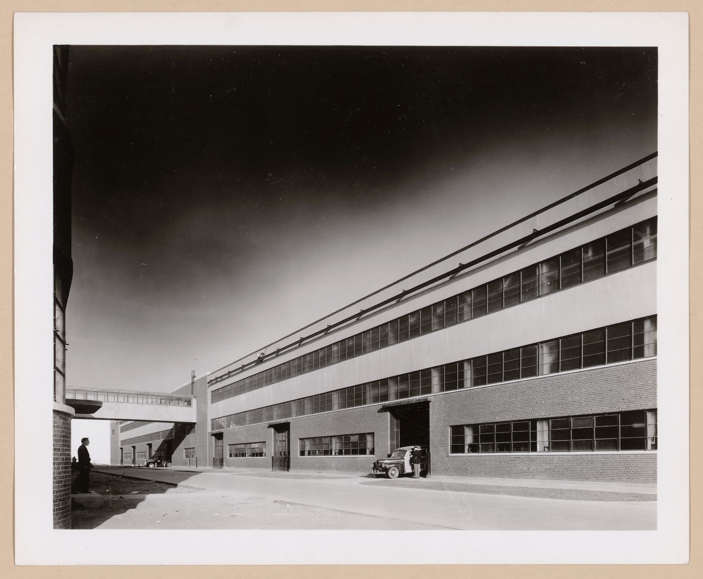 View of the west façade of the Manufacturing Building showing the skywalk to the School, Ford Motor Company Willow Run Bomber Assembly Plant, Willow Run, Michigan