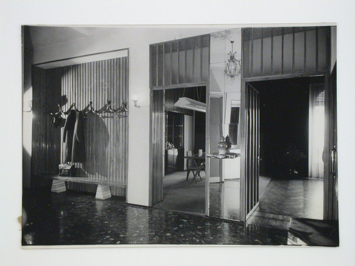 Interior view of Casa Orengo showing the entrance hall looking in two adjacent rooms, Turin, Italy