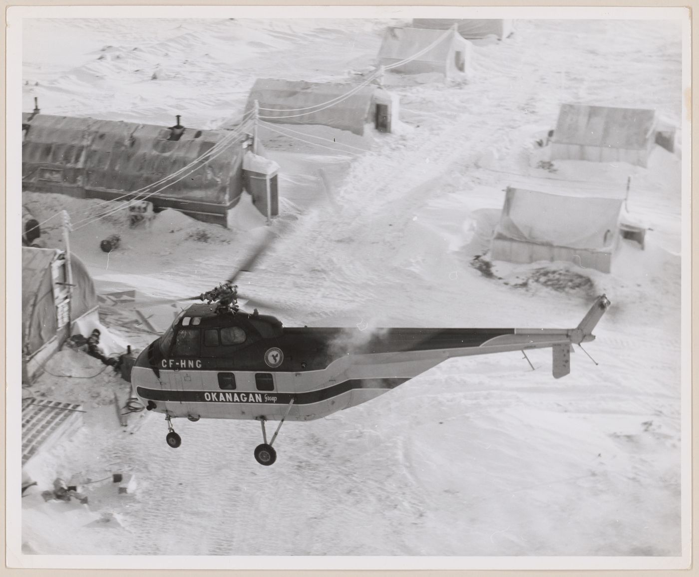 View of Okanagan helicopter at DEW Line radar station FOX-3, Dewar Lakes, Nunavut, Canada