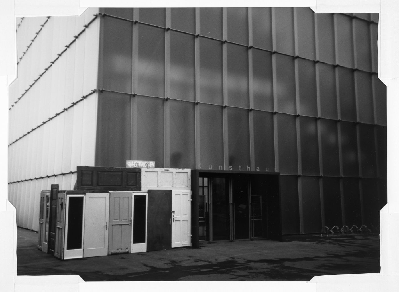 View of a site-specific work by Franco Vaccari showing second-hand wooden doors installed by the entrance of the Kunsthaus [museum], Bregenz, Austria