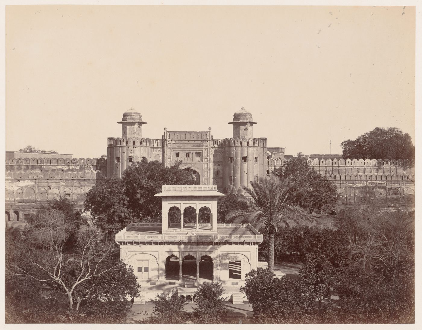 View of a pavilion in the Huzoori Bagh with a gateway of the Lahore Fort in the background, Lahore, India (now in Pakistan)