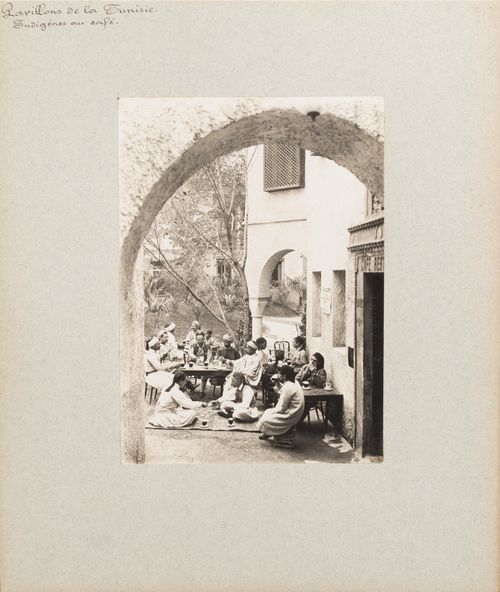 View of people seated outdoors at café, Tunisian section, Exposition universelle, 1900, Paris, France