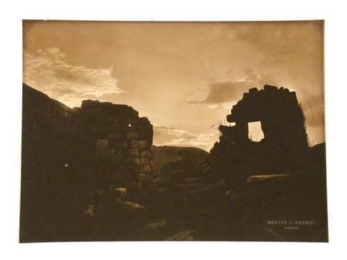 Evening view of the Intihuatana Stone taken from inside the Little Temple, Intihuatana Hill, Machu Picchu, Peru