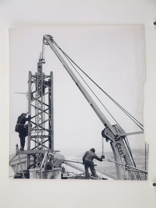 View of construction on a steel structure with a crane, United Kingdom
