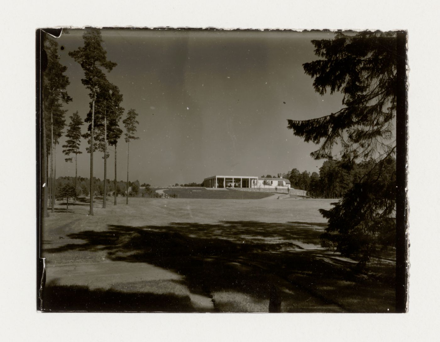 Distant view of the loggia of Monument Hall and the Chapel of the Holy Cross, Woodland Crematorium and Cemetery, Stockholm