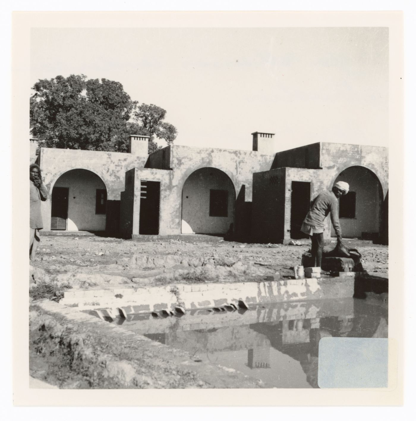 View of houses under construction, possibly in Nāgla, India