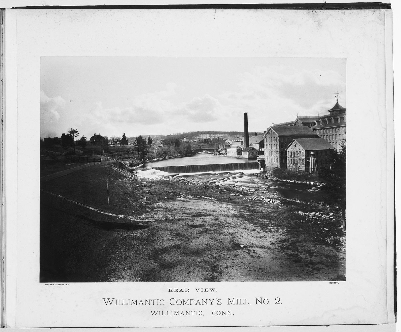 Rear view of the Willimantic Company’s mills, with dam, town of Willimantic, now Windham, Connecticut, United States
