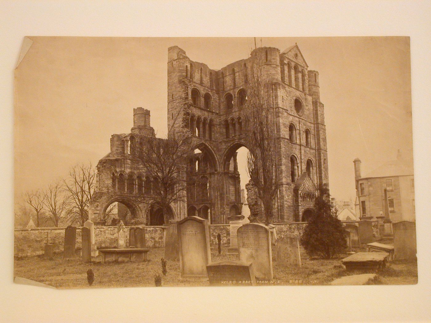 View of Kelso Abbey taken from the northeast showing its cemetery in the foreground, Kelso, Roxburghshire, Scotland