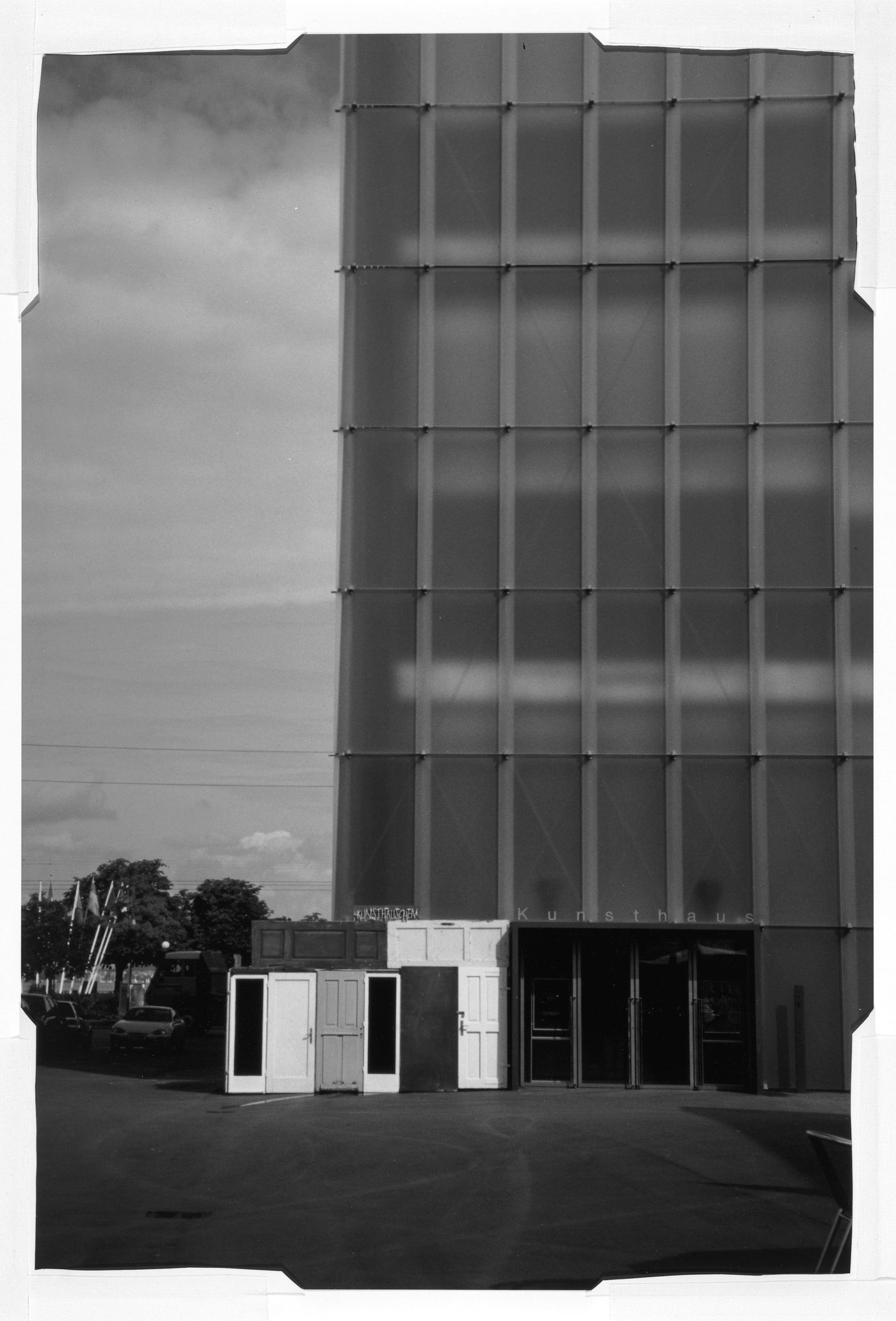 View of a site-specific work by Franco Vaccari showing second-hand wooden doors installed by the entrance of the Kunsthaus [museum], Bregenz, Austria