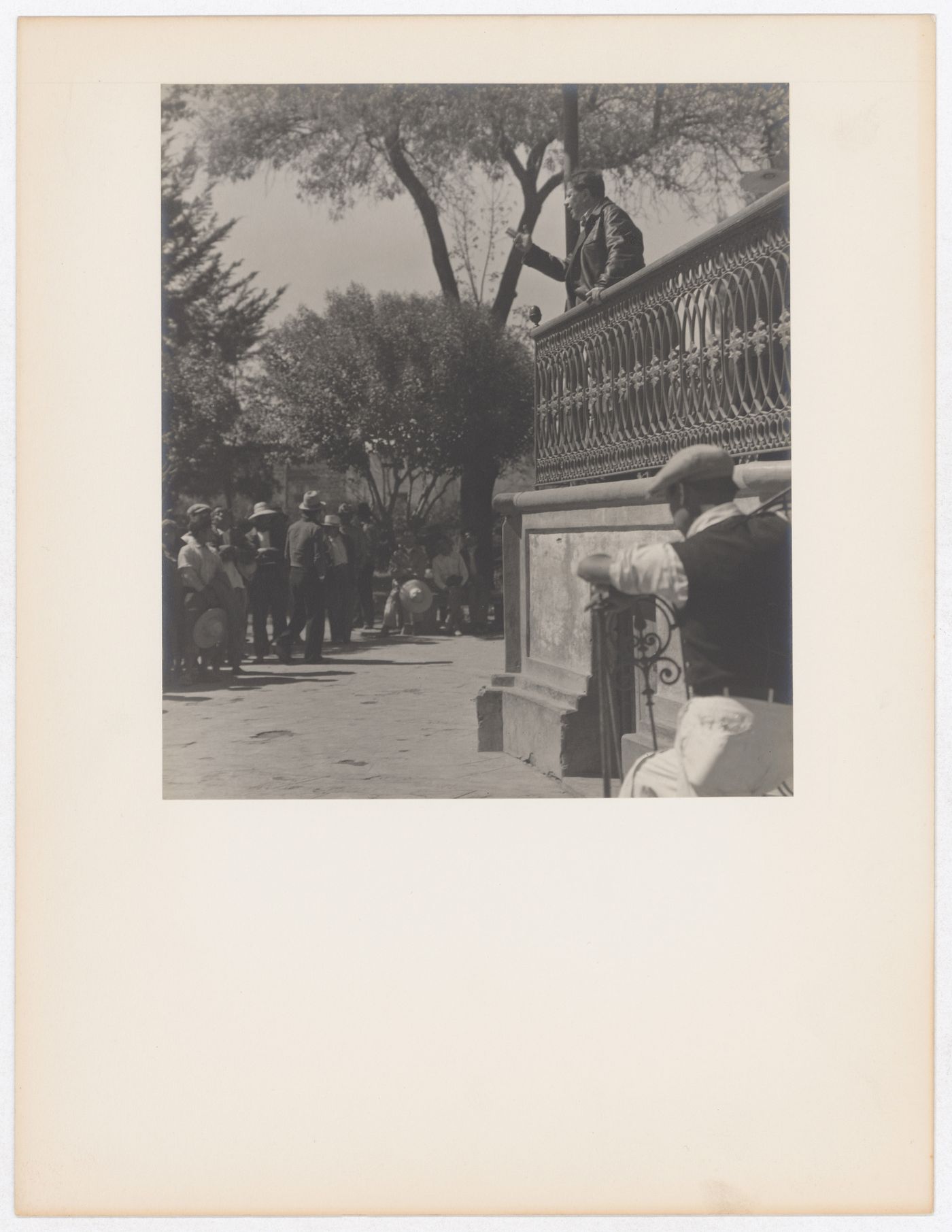 View of an agrarian meeting showing Diego Rivera speaking from a balcony, Mexico