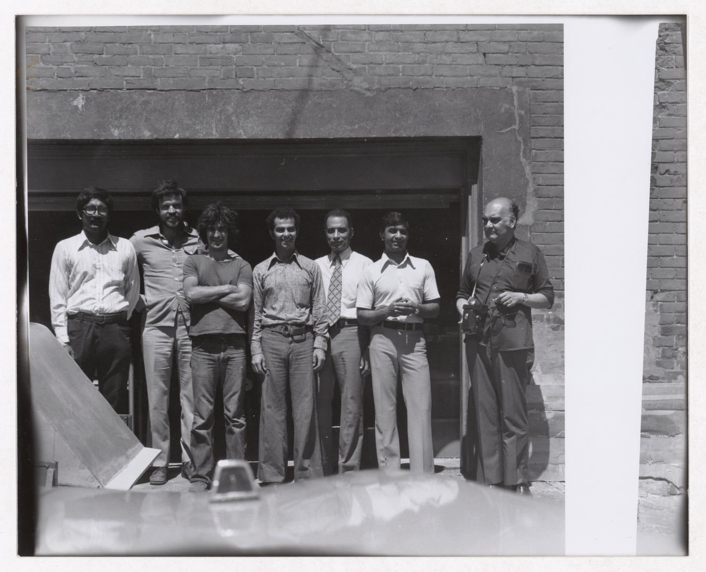 Photograph of the Minimum Cost Housing Group members