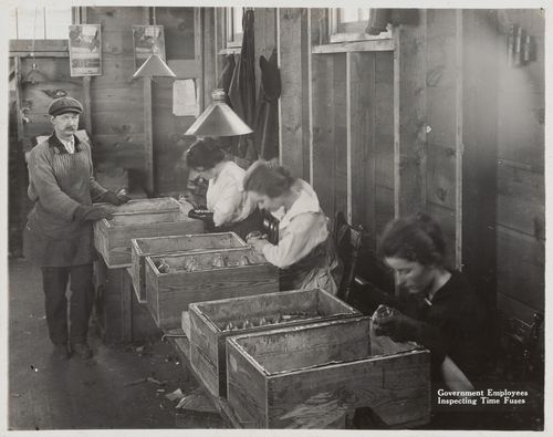 Interior view of workers inspecting time fuses at the Energite Explosives Plant No. 3, the Shell Loading Plant, Renfrew, Ontario, Canada