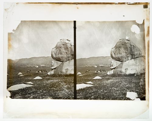 Stereograph of horse riders and large rocks, California, United States of America