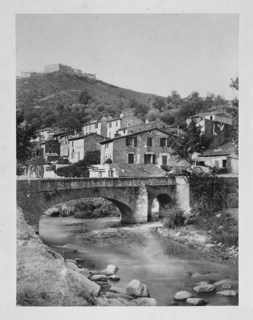 View of houses, with bridge and river in foreground, Amélie-les-Bains-Palada, France