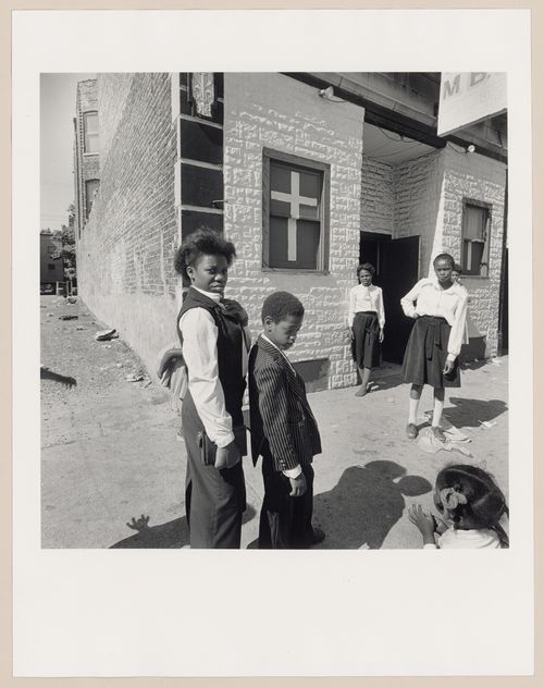 View of churchgoers in front of church, probably Chicago, United States
