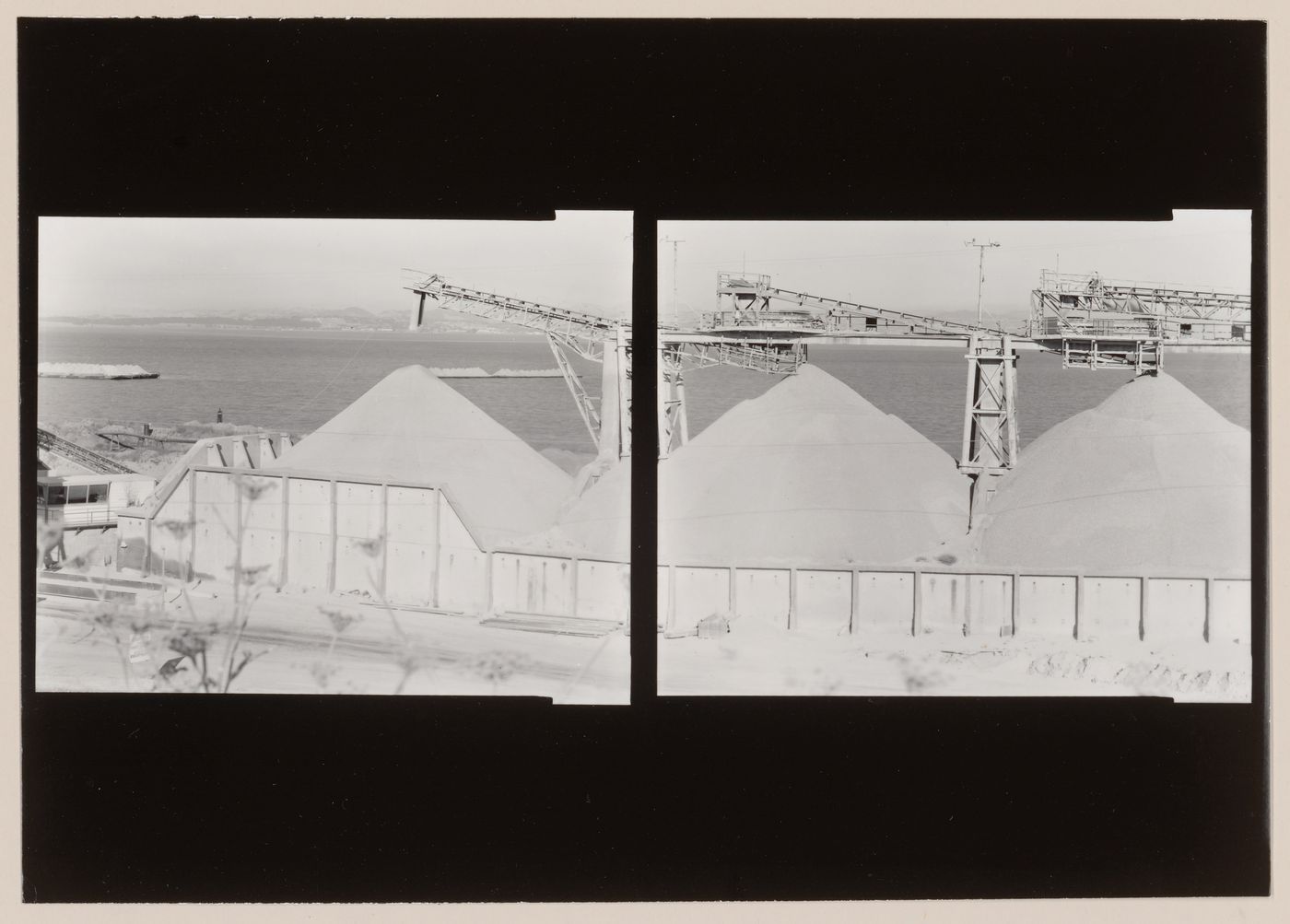 Panoramic composite photograph of the San Rafael Rock Quarry showing mounds of basalt and machinery with San Francisco Bay in the background, Point San Pedro, San Rafael, Marin County, California, United States