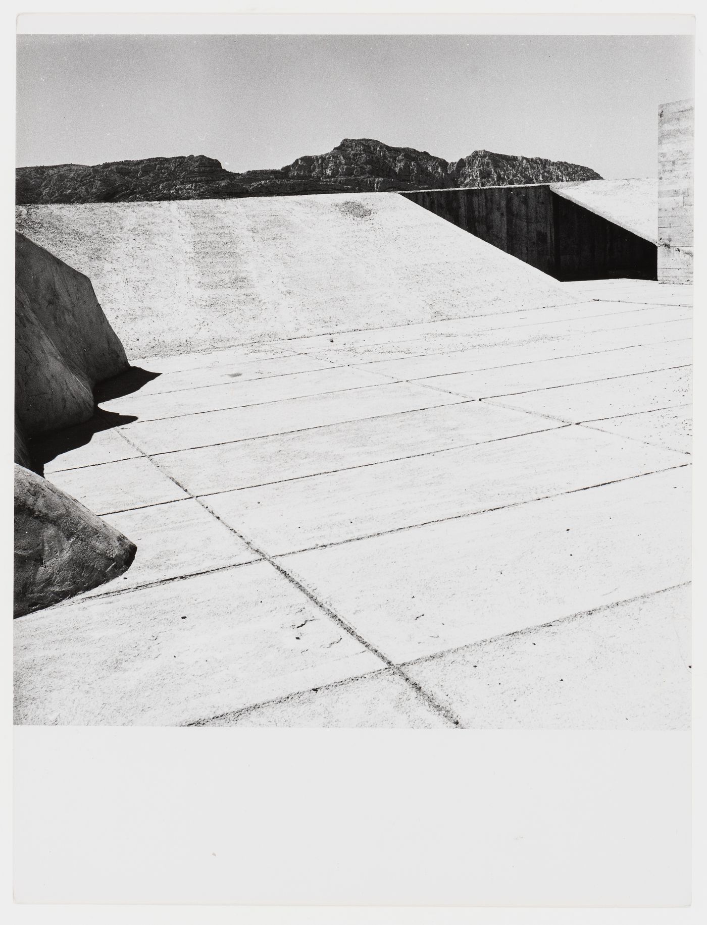 View of the roof of Unité d'habitation showing the terrace and mountains in the distance, Marseille, France