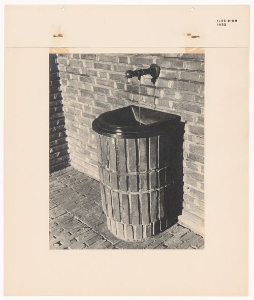 View of a brick-faced sink, a faucet and a wall and in the New Jewish Cemetery [Neuer Jüdischer Friedhof], Frankfurt am Main, Germany