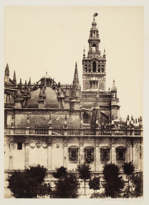 View of the Seville Cathedral, also known as Cathedral of Saint Mary of the Sea, and the bell tower Givalda, Seville, Spain