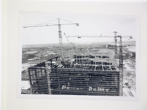 View of cranes and construction of steel structure for power station, from exterior, United Kingdom