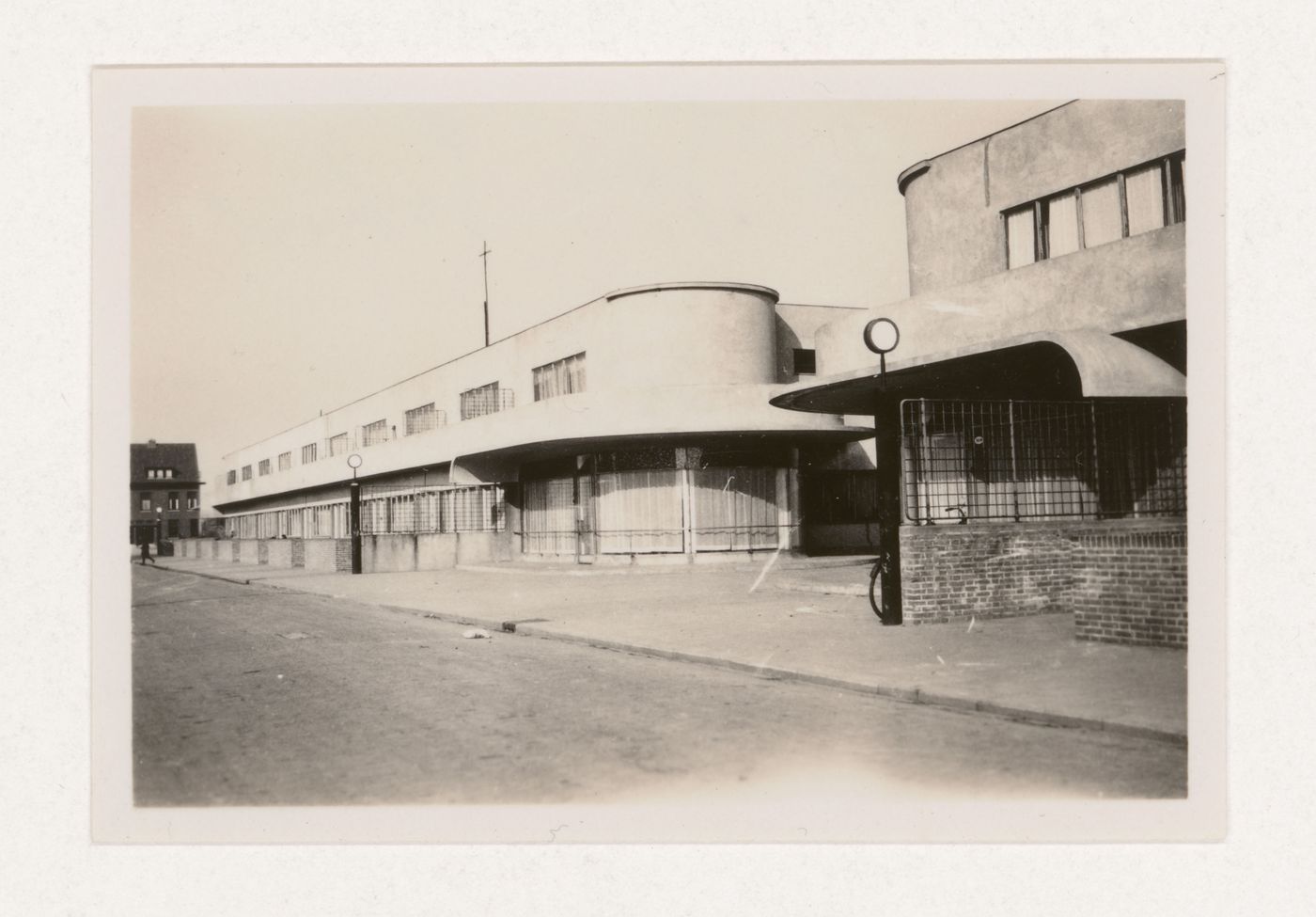 Exterior view of industrial row houses from the street, Hoek van Holland, Netherlands