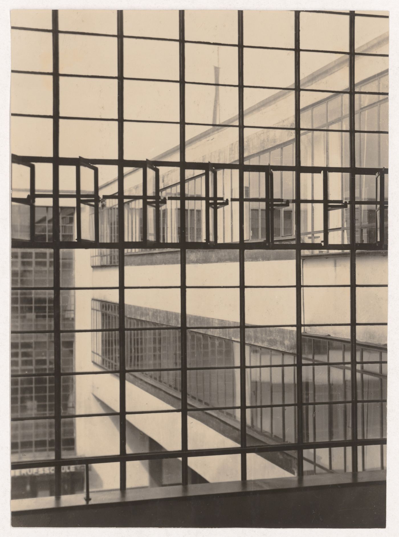 Exterior view of the Bauhaus building showing the housing wing of Dessau Technical School and the administration wing through a window, Dessau, Germany