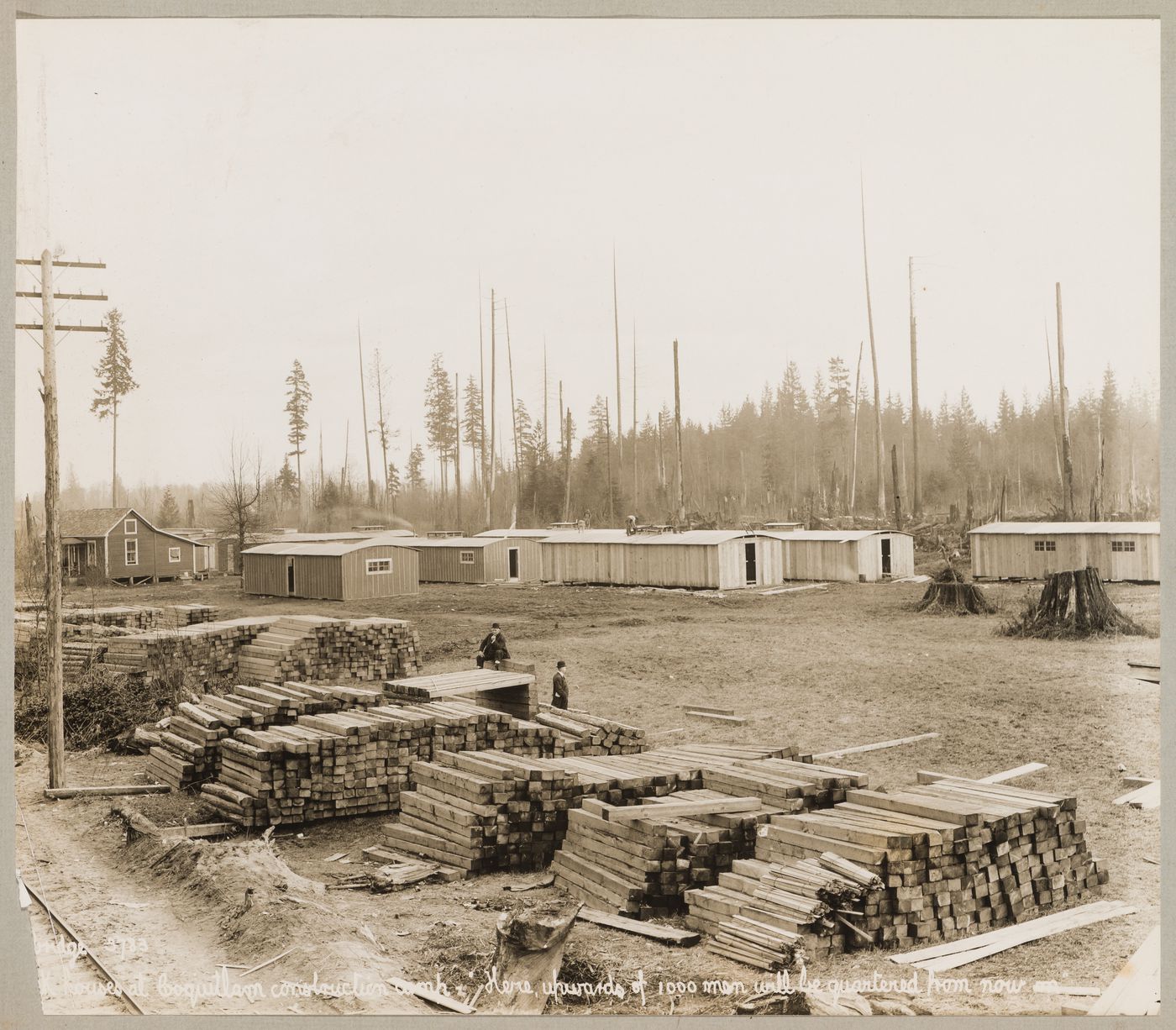 View of the Canadian Pacific Railroad Company construction camp showing barracks and railway ties, Coquitlam (now Port Coquitlam), British Columbia