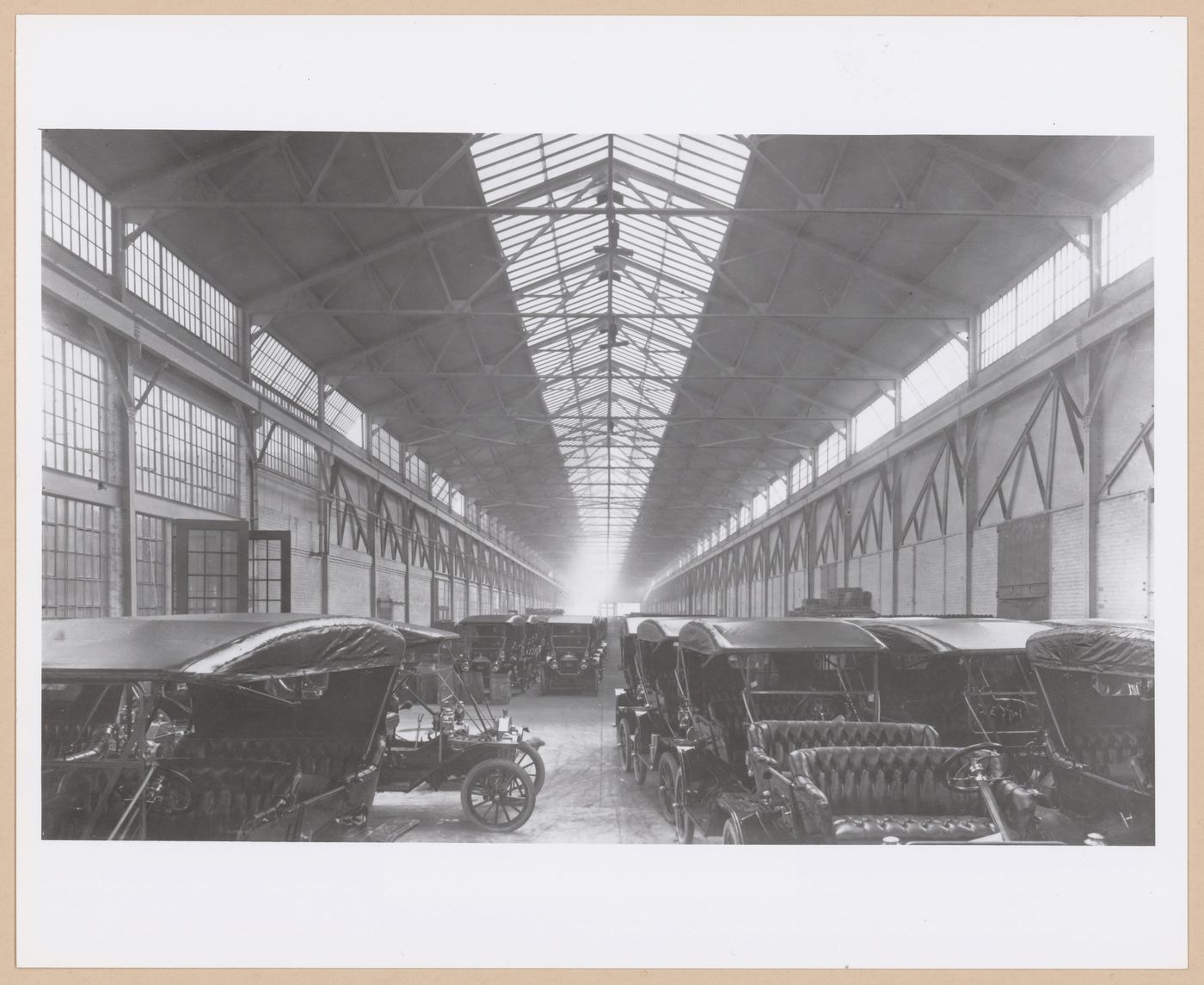 Interior view of a warehouse showing Model-T cars, Highland Park Plant (now abandoned), Ford Motor Company, Highland Park, Michigan