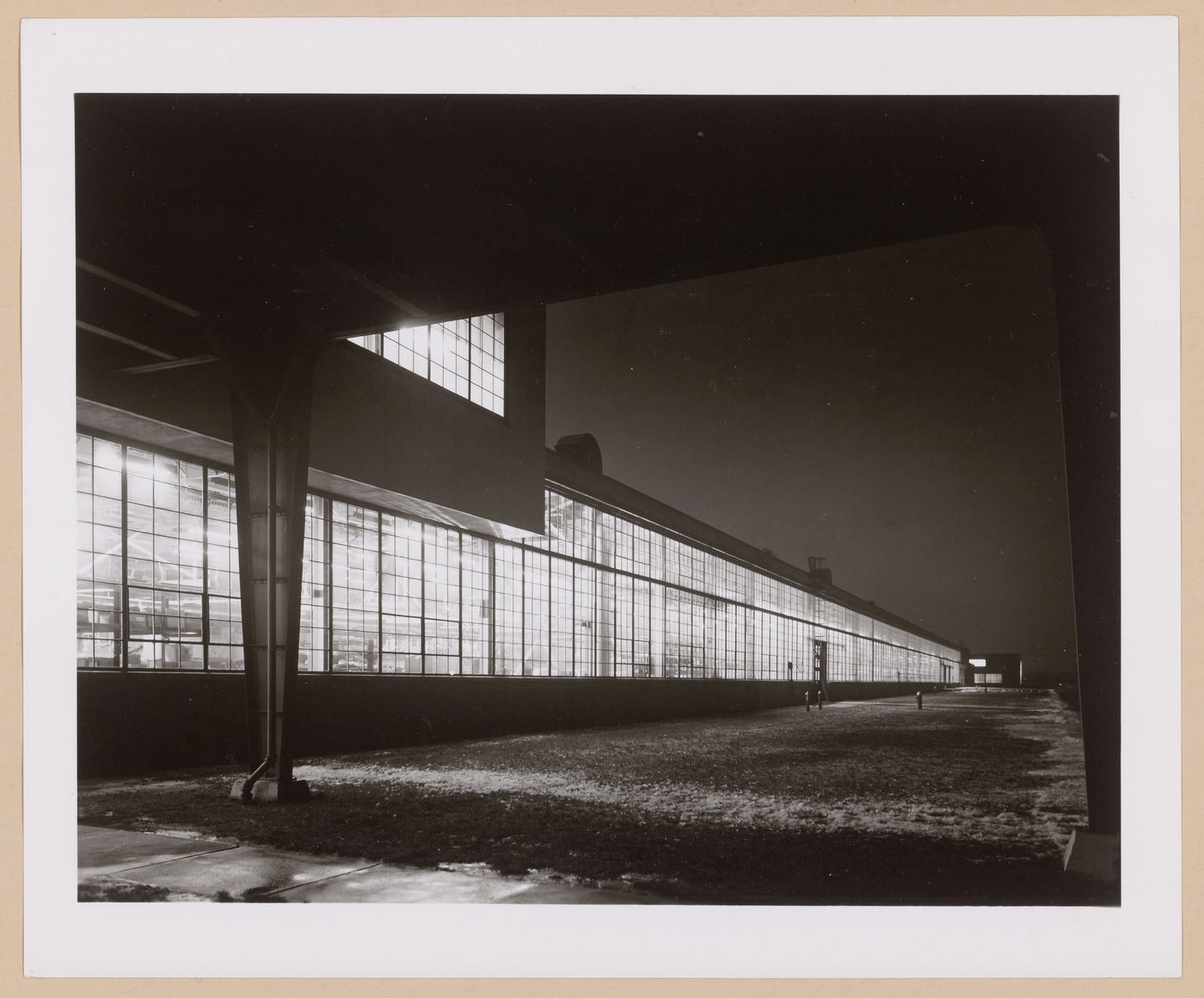 View of the north façade of the Assembly Building at night from below the skywalk, Ford Motor Company Lincoln-Mercury division Automobile Assembly Plant, Saint Louis, Missouri