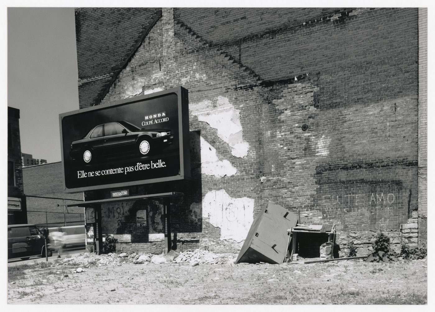 Field Work in Montreal: View of a wooden shack-like structure, refuse, a billboard, a brick wall, and a vacant lot, Montréal, Québec