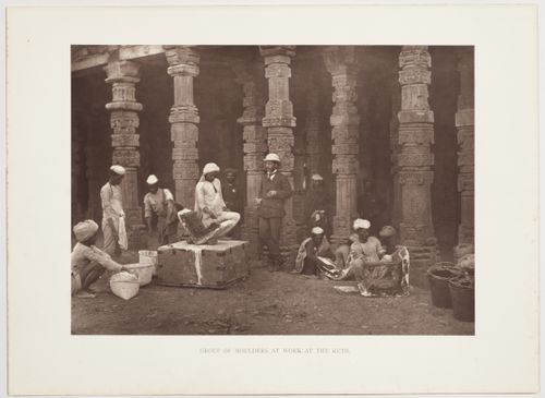 View of moulders working under supervision of Henry Hardy Cole, in the courtyard of the Quwwat al-Islam mosque, in the Qutb Minar complex, with colonnade in the background, Delhi, India
