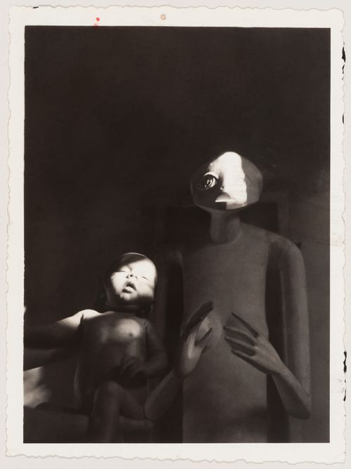 Gordon Matta with Alberto Giacometti's sculpture, Hands Holding the Void, at the Patchin Place apartment, New York City