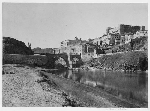 View of Pont d'El Kantara with city, probably Spain