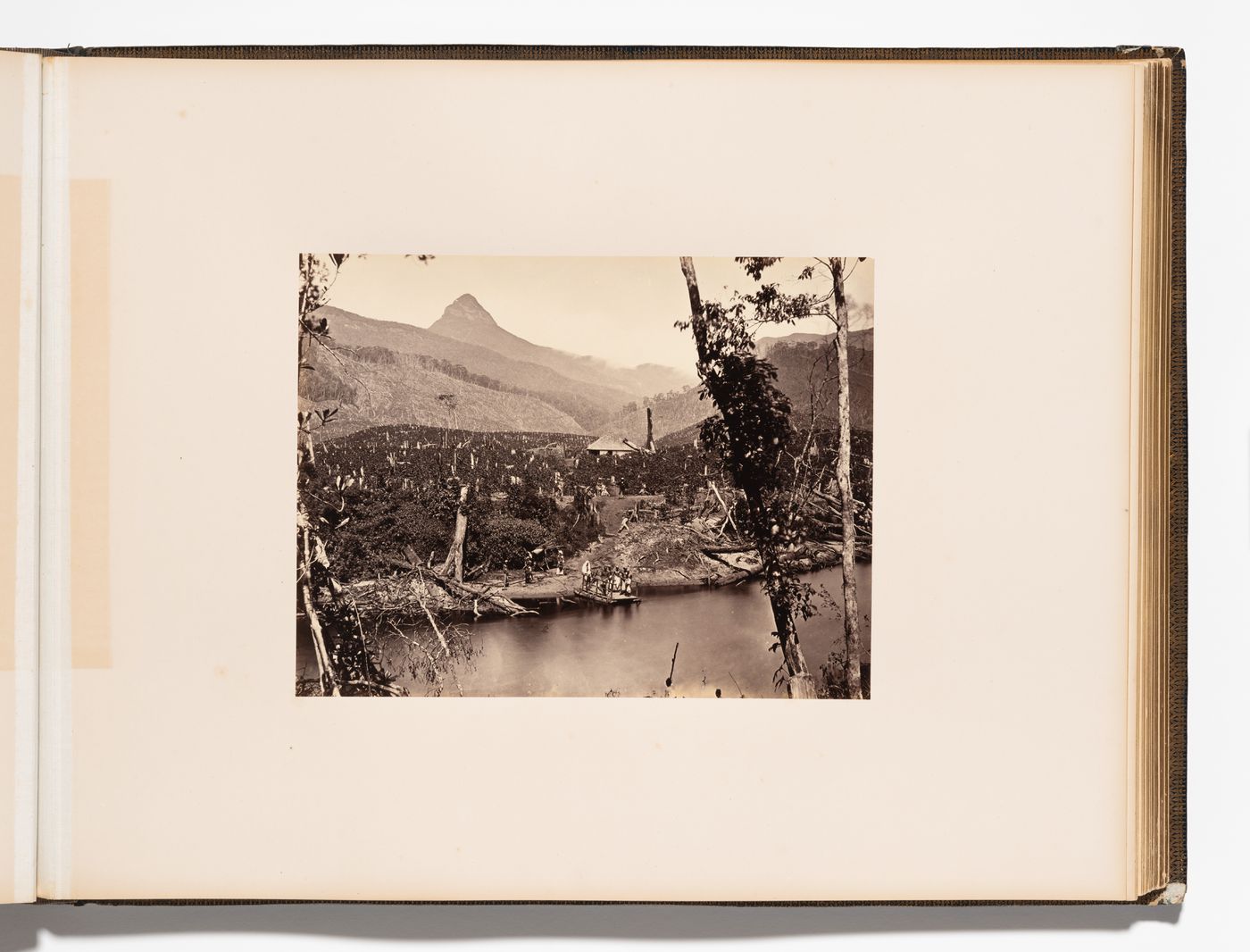 View of a plantation with a river in the foreground and Adam's Peak in the background, Ceylon (now Sri Lanka)