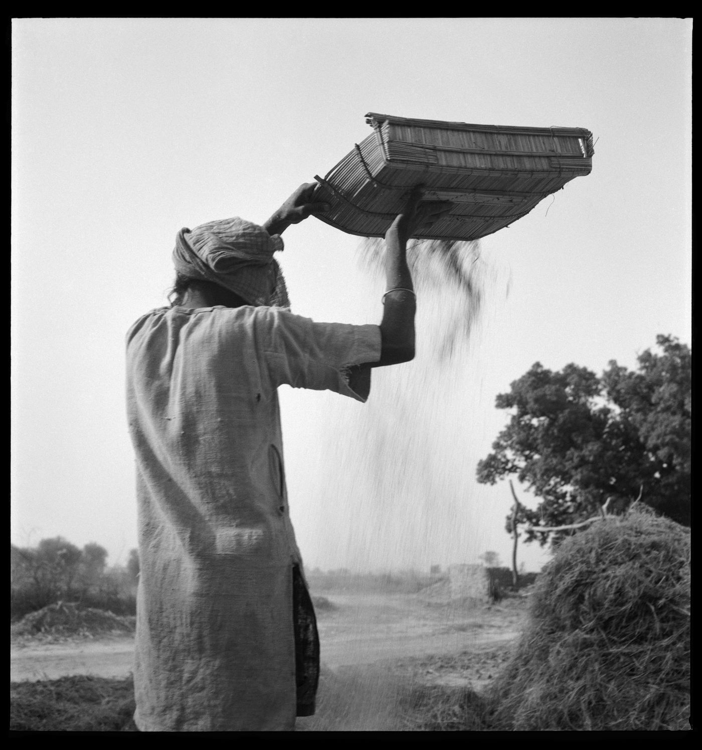 View of man sifting sand in Chandigarhès area before the construction, India