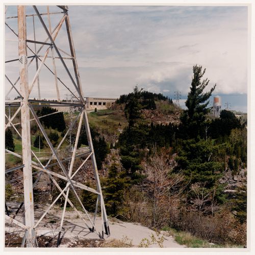 Section 2 of 4 of Panorama of the Shipshaw hydro-electric site, looking northeast, showing pylon, dam, power station, and Saguenay River