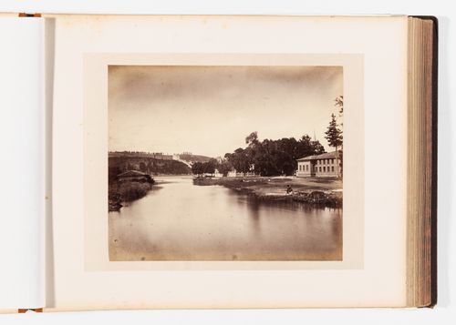 View of a river showing the fence of the Küçüksu Palace (also known as the Göksu Palace) with the Bosporus and the Rumeli Hisari in the background, Constantinople (now Istanbul), Ottoman Empire (now in Turkey)