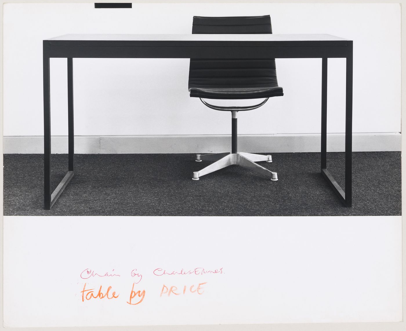 View of a table designed by Cedric Price for the Robert Fraser Gallery, with a chair by Charles Eames