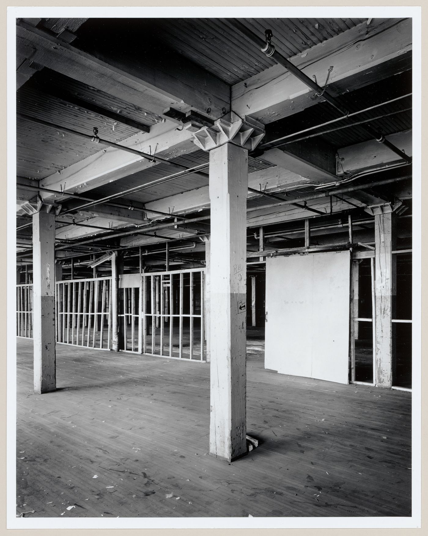 Interior view of the Canadian Bag Company Building showing post-and-beam structures, Montréal, Québec