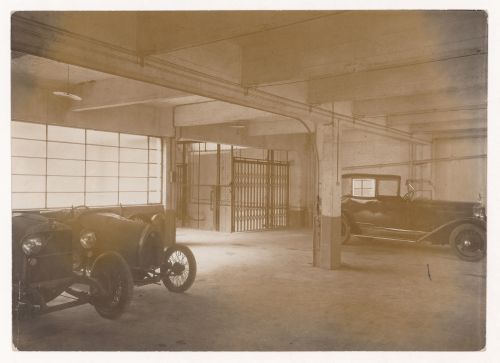 Interior view of Alfa Romeo Garage, showing cars in parking lot, Marbeuf road, 8th arrondissement, Paris, France