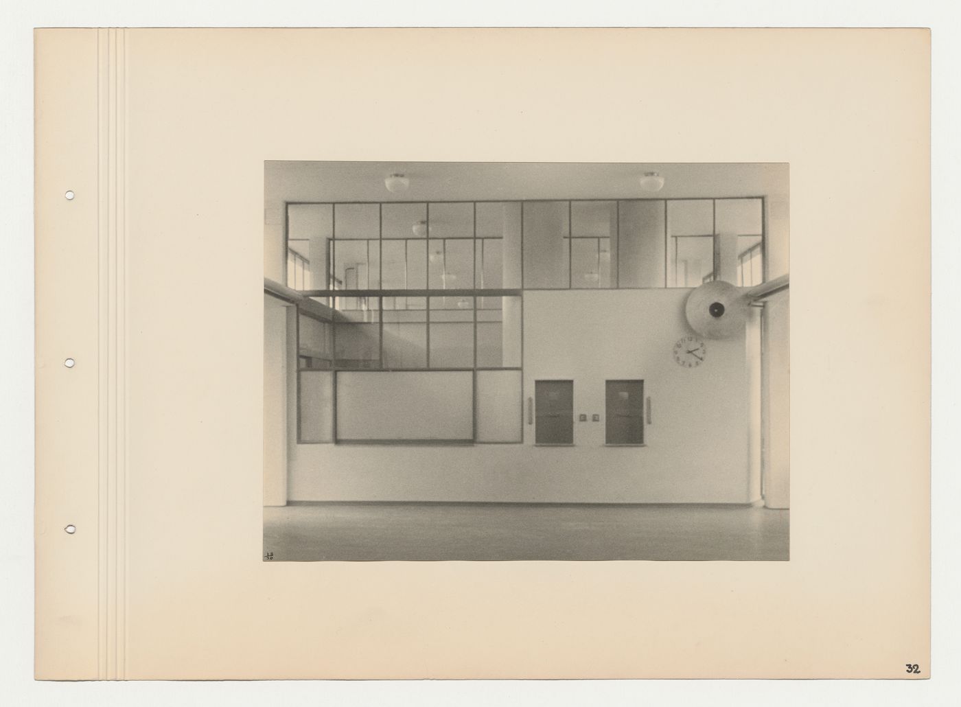 Interior view of the unfurnished dining hall showing pantry service windows, Budge Foundation Old People's Home, Frankfurt am Main, Germany